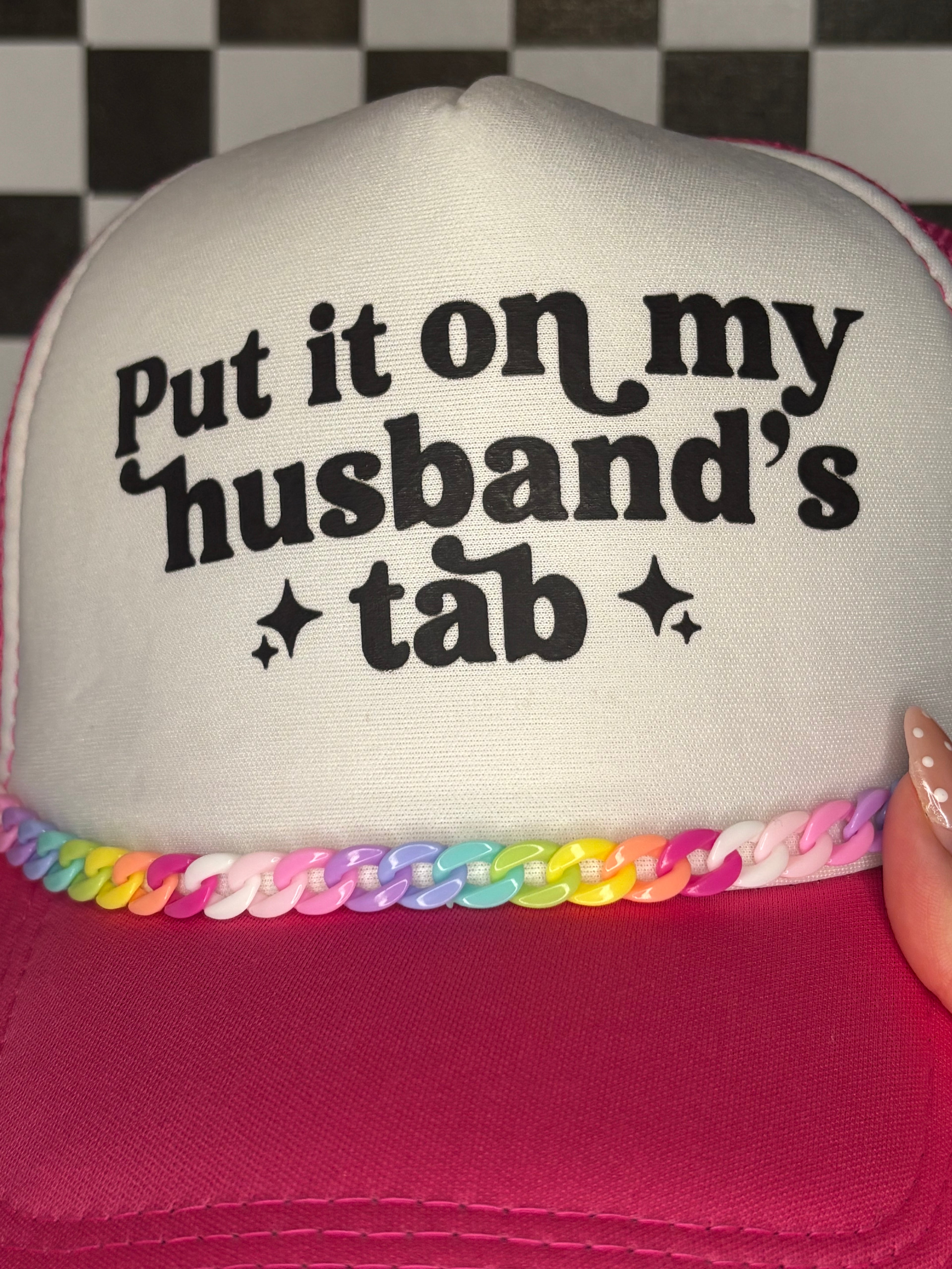 Put It On My Husbands Tab Trucker Hat